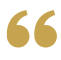 Gold quotation marks on a black background.